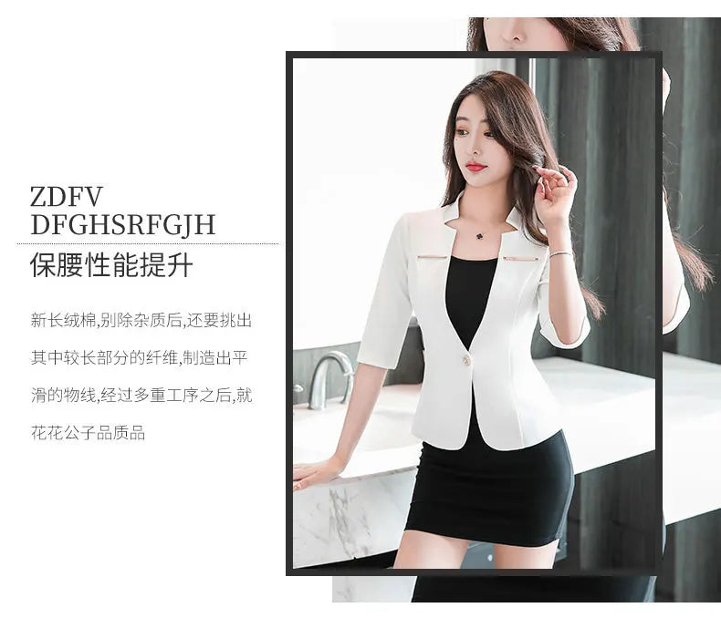 A professional white three-quarter sleeve blazer with a single-button closure worn over a black fitted dress.