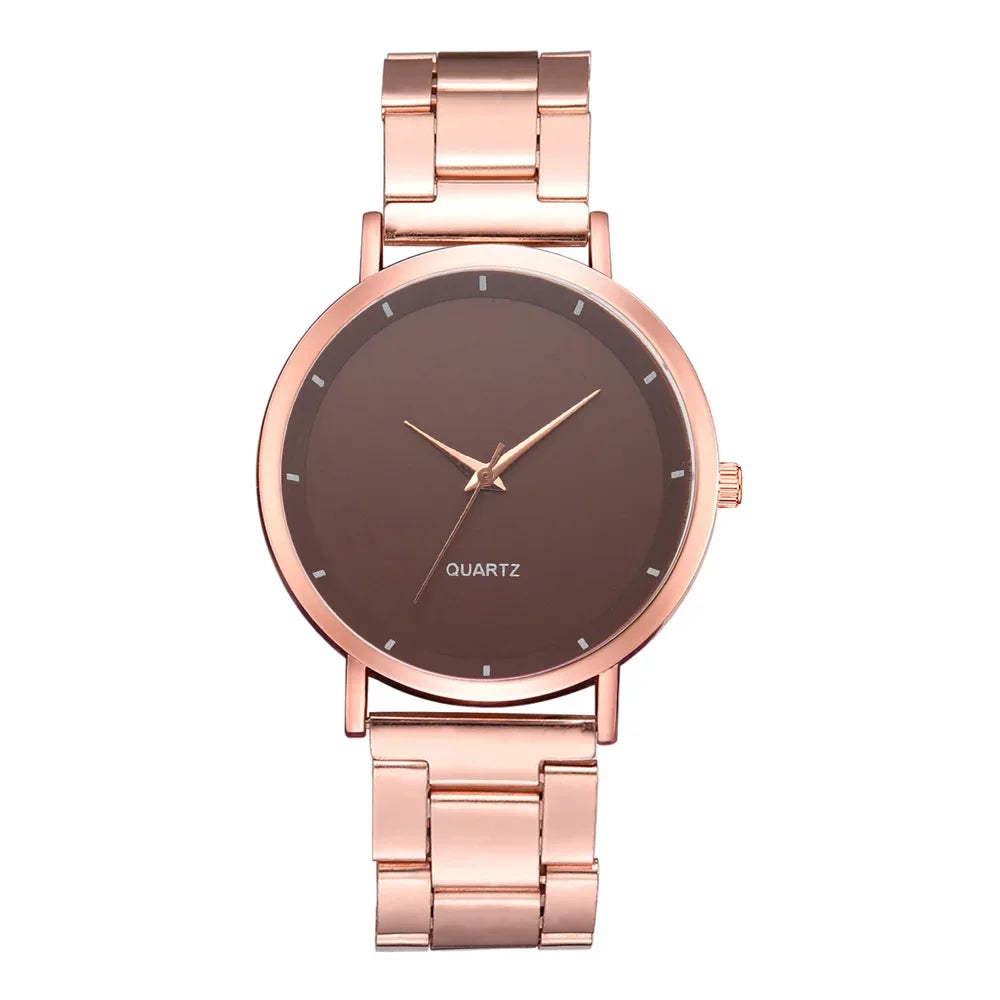 Ladies' rose gold stainless steel watch with a minimalist brown dial and slim link bracelet.