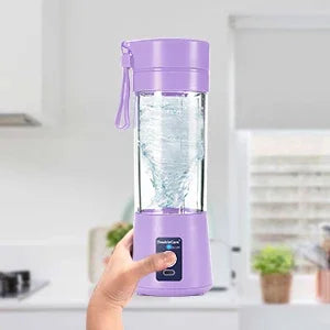 Portable purple personal blender with a clear mixing chamber, carry strap, and simple push-button operation.