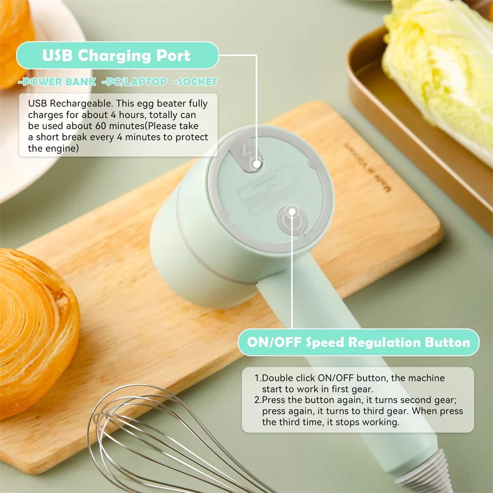 Pastel green handheld electric egg beater with USB charging port and speed control button on a wooden cutting board.