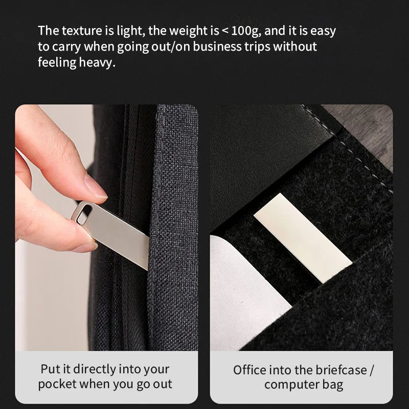 Sleek silver metal USB flash drive being held and stored in a pocket or bag for portable, lightweight convenience.