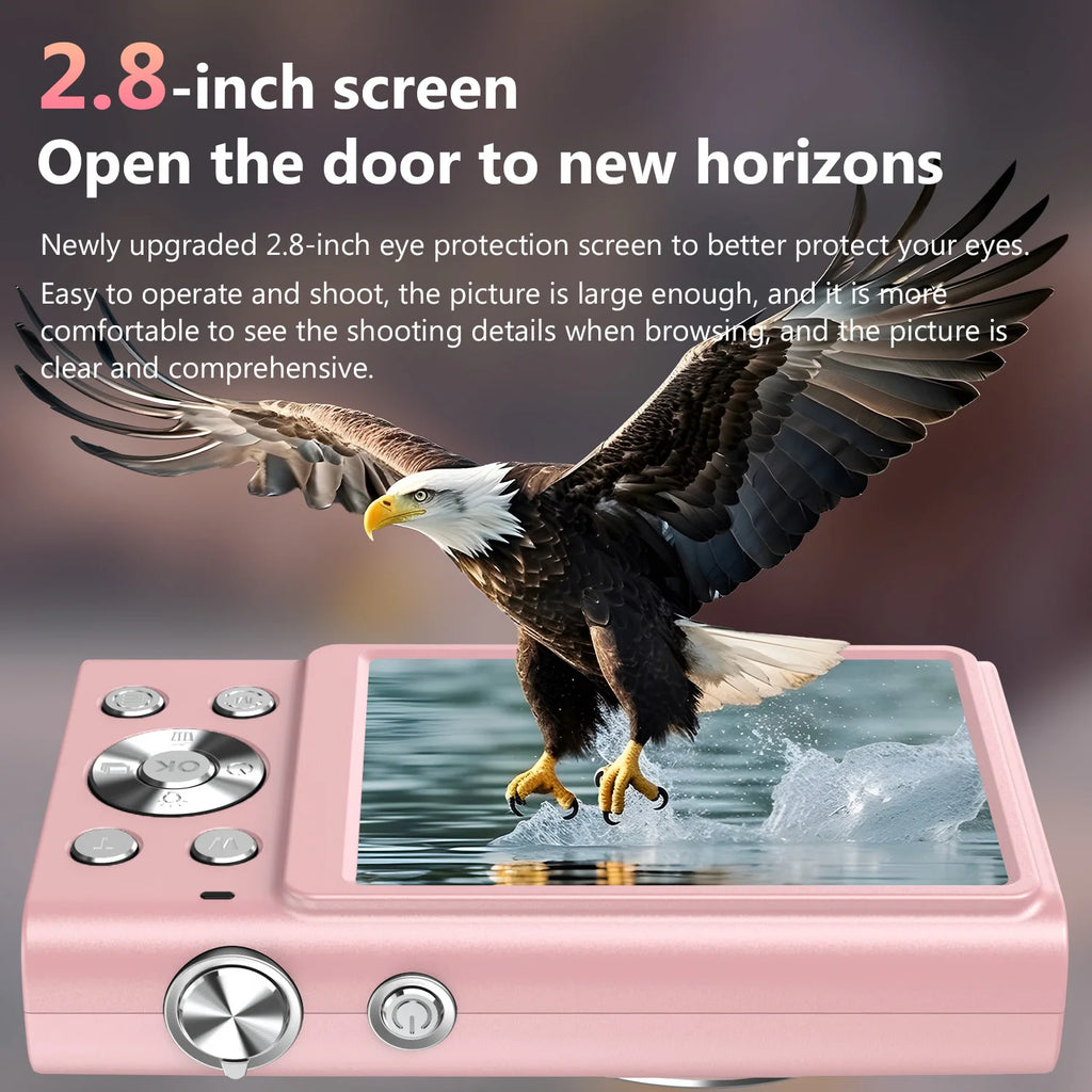 Pink digital camera with a 2.8-inch screen and silver control buttons, showing a picture of a bald eagle in flight.