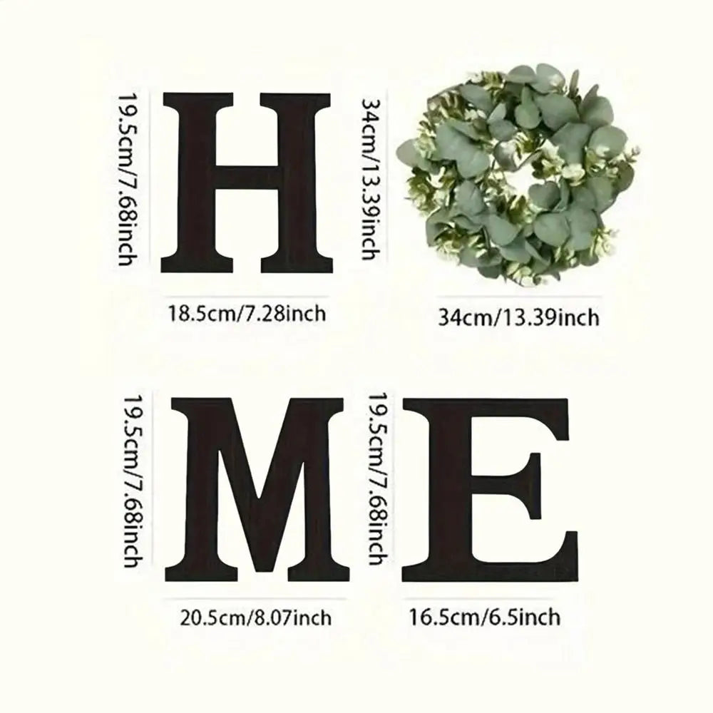 Rustic 'HOME' sign set with black wooden letters and a lush artificial eucalyptus wreath for the letter 'O'.