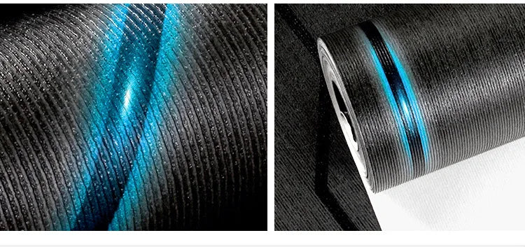Modern black wallpaper with textured vertical ridges and a striking, glossy blue reflective 3D diagonal stripe.
