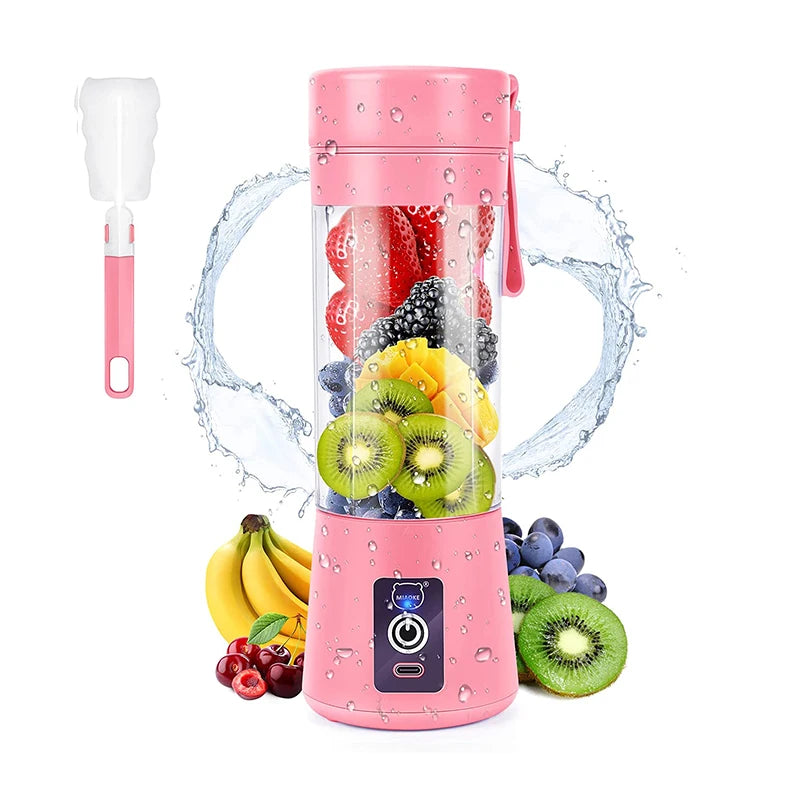Pink portable electric blender bottle filled with fresh fruit, accompanied by a small cleaning brush.