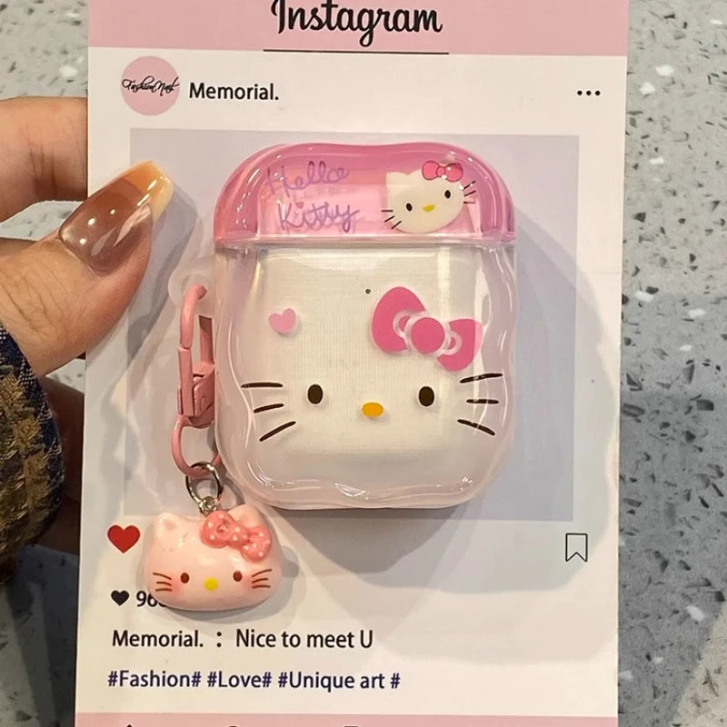 Clear Hello Kitty AirPods case in pink, featuring a character charm and keyring attachment.
