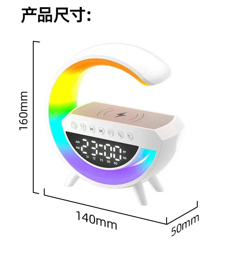 C-shaped white digital alarm clock with a rainbow LED light, wireless charging pad, and Bluetooth speaker controls.