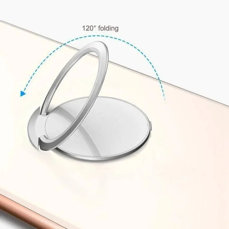 Silver circular phone ring holder with a 120-degree foldable design attached to a phone.