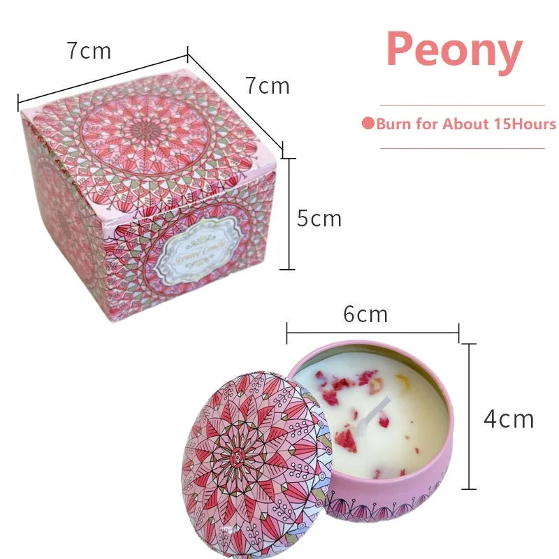 Peony scented candle in a decorative pink patterned metal tin, 15-hour burn time, includes matching gift box.