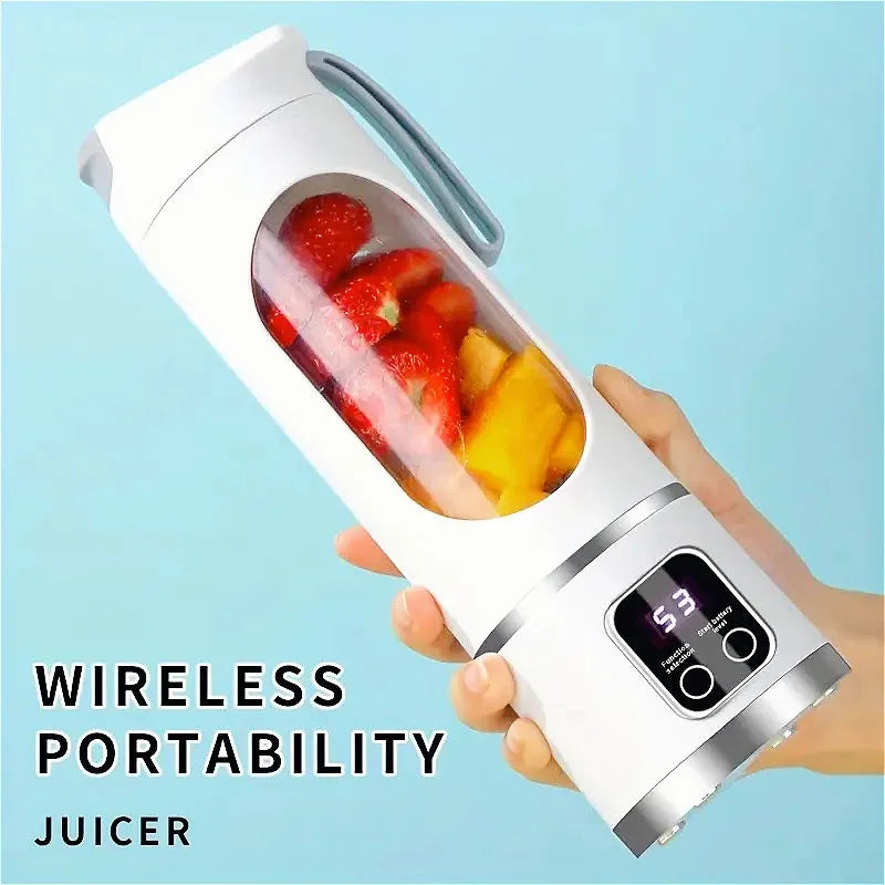 Portable white electric blender with a clear fruit-filled center and a digital display showing battery level.
