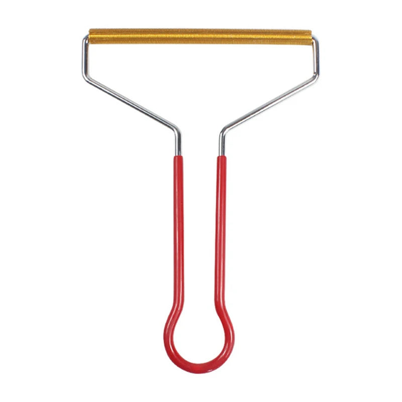 Fabric lint remover with a gold-tone metal scraper head and a red U-shaped handle on a white background.