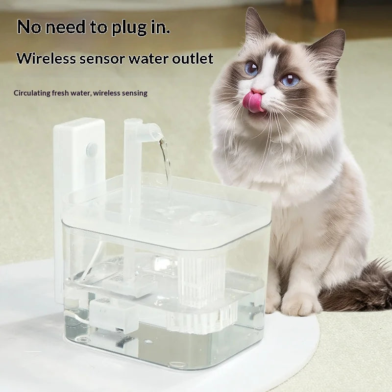 A white, wireless automatic pet water fountain with a clear tank, filtering system, and motion sensor.