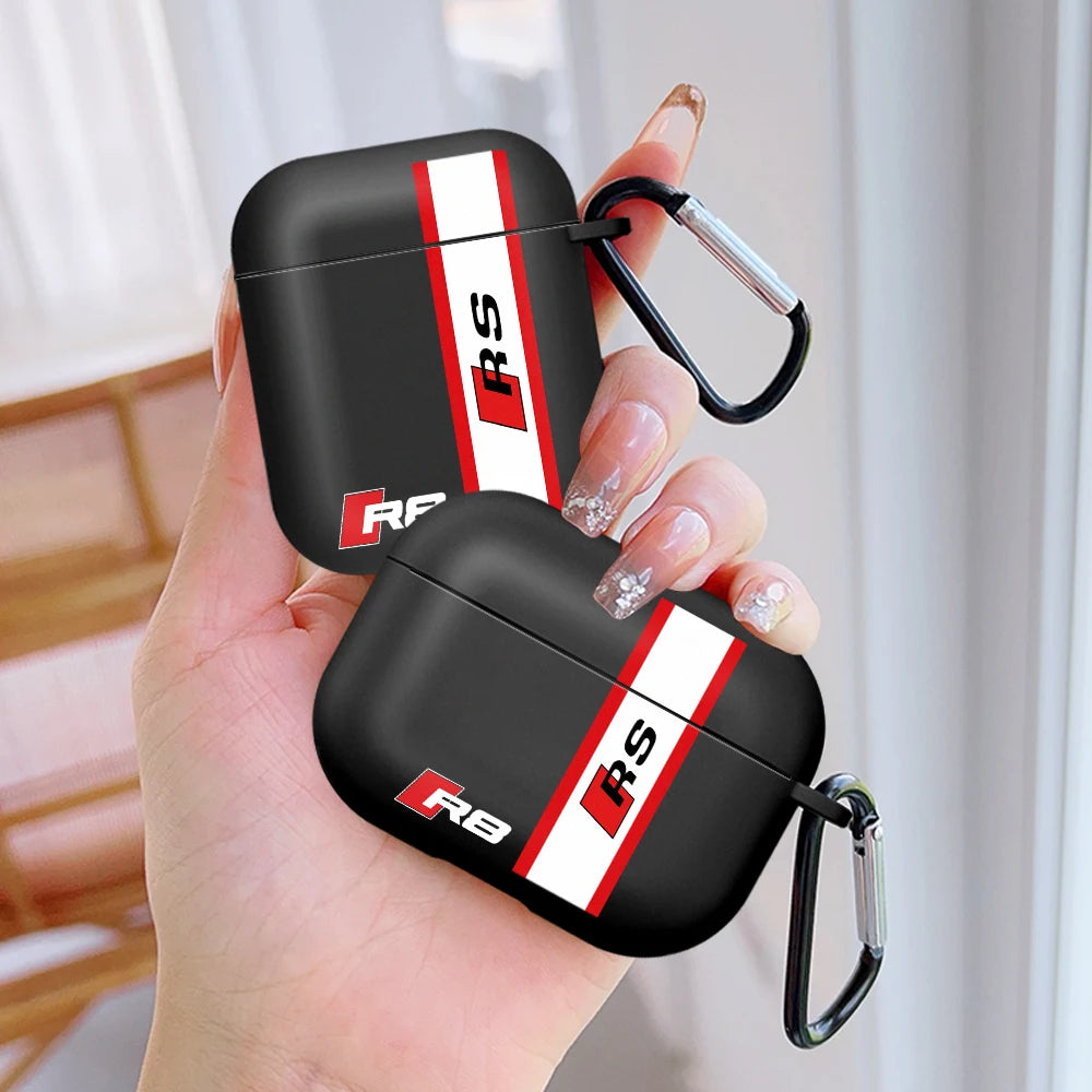 Black silicone case for AirPods with red/white Audi RS branding and carabiner clip.