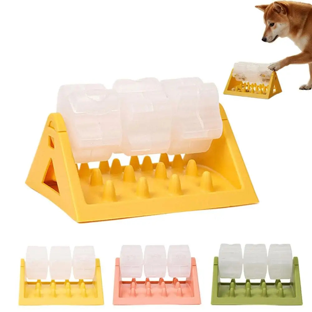 Yellow interactive dog puzzle feeder with clear spinning treat barrels and a slow-feed base. Available in three colours.