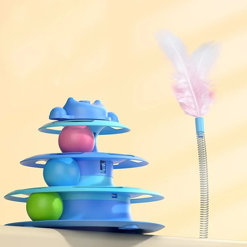 Blue three-tier cat toy turntable with colourful balls and a spring-mounted feather teaser wand.