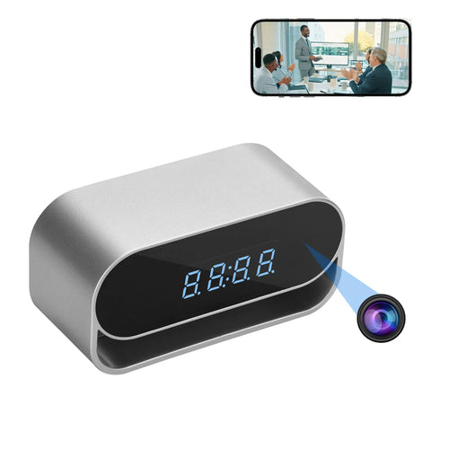 Silver metal digital alarm clock with a black display screen and a small integrated spy camera.