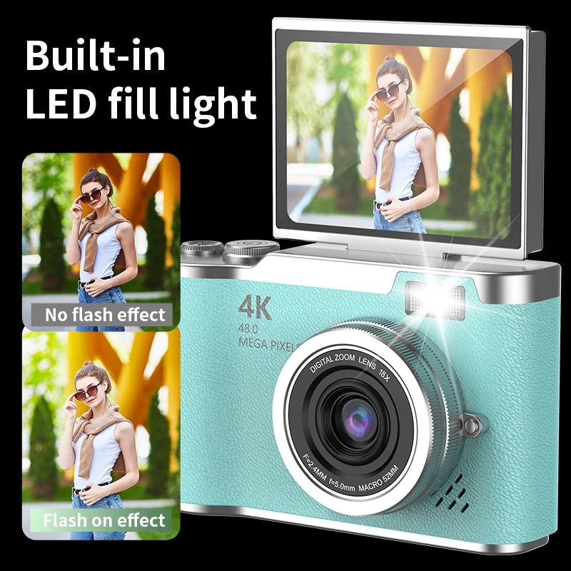 Light blue plastic 4K digital camera with an 18x zoom lens, flip-up screen, and built-in LED fill light.