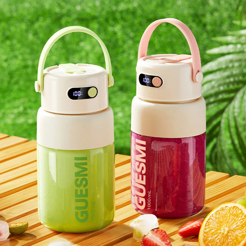 Two 1000ml portable blenders with carry handles and digital battery displays, one in lime green and one in berry pink.