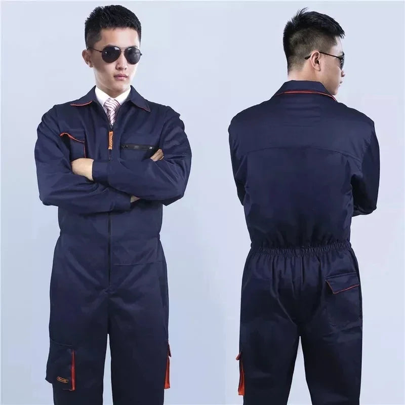 Navy blue cotton-blend work coveralls with orange trim, front and back pockets, and an elasticated waist.