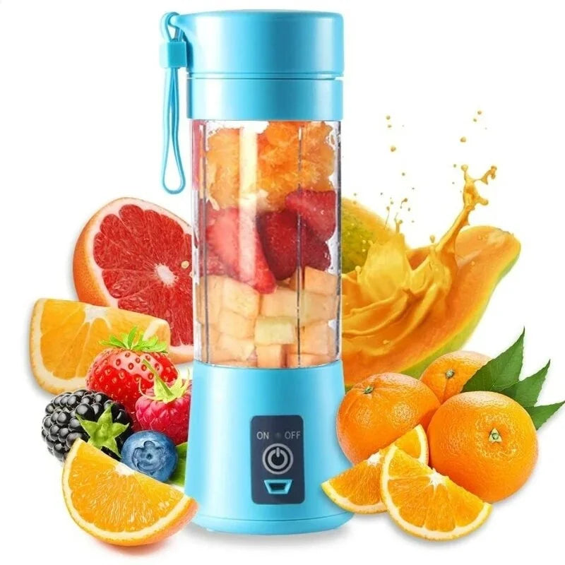 Portable light blue electric blender filled with chopped fruit, surrounded by fresh grapefruit, berries, and oranges.