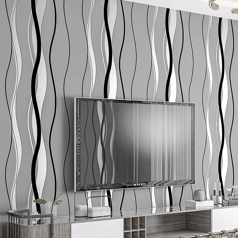 Modern Nordic wallpaper featuring vertical black, white, and grey wavy stripes in a contemporary living room setting.
