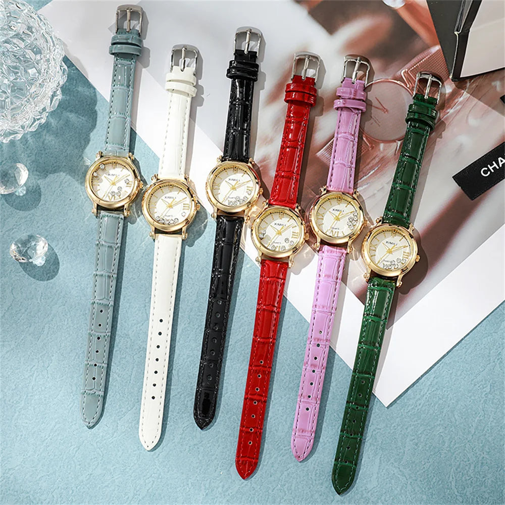 Six elegant women's quartz watches with gold-tone faces and croc-effect leather straps in various vibrant colours.