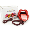 Novelty red lips-shaped telephone with a white teeth and tongue design, complete with a coiled cord and original box.