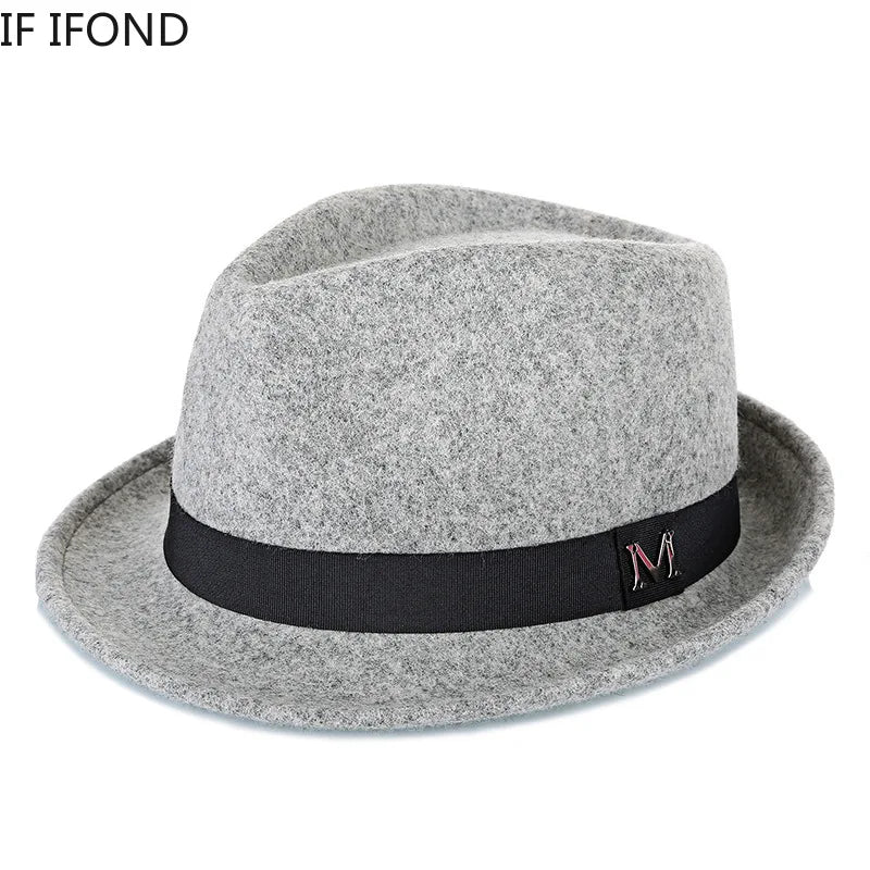 Classic grey wool felt fedora with a black grosgrain ribbon band and a subtle metal 'M' detail on the side.
