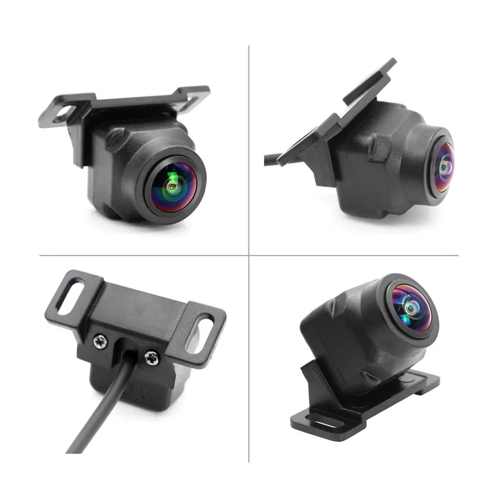 Four views of a black vehicle reversing camera with a wide-angle, iridescent fisheye lens and mounting bracket.