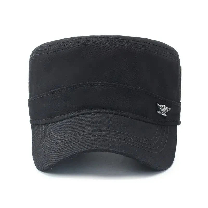 Black cotton military-style cadet cap with a flat top, curved peak, and a silver eagle emblem on the side.