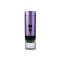 Purple portable espresso maker with a black control panel and clear grooved cup base on a white background.