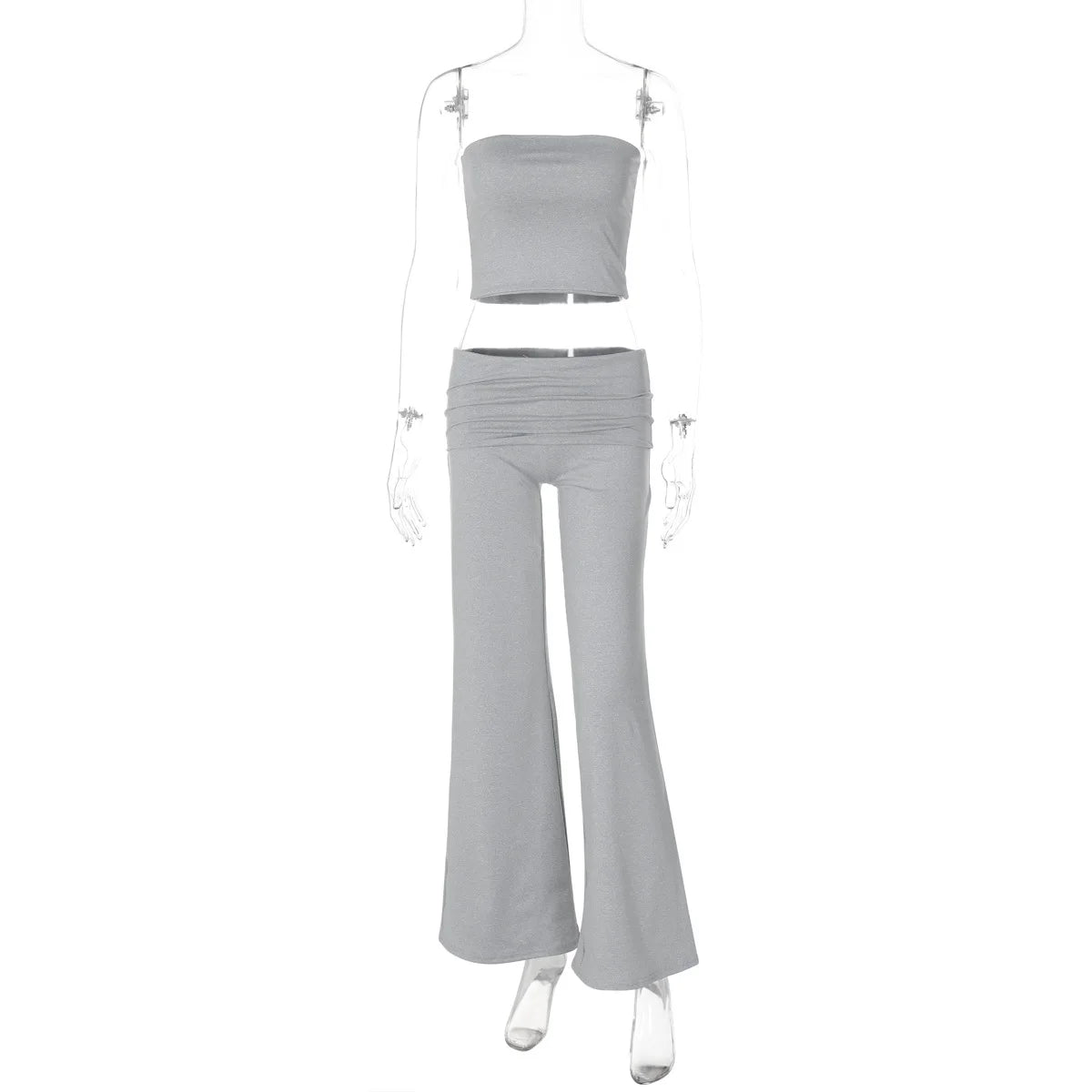 Grey two-piece set featuring a strapless crop top and high-waisted, flared trousers with a ruched waistband.