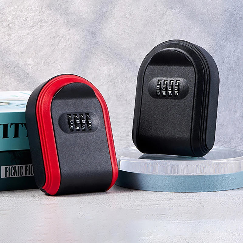 Two metal key lock boxes, one black and red, one all black, each with a four-digit combination dial.