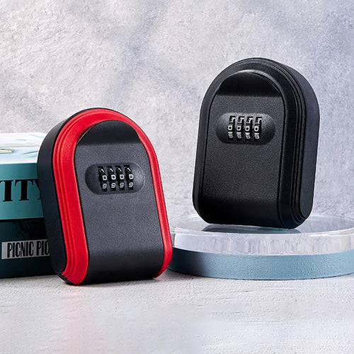 Two metal key lock boxes, one black and red, one all black, each with a four-digit combination dial.