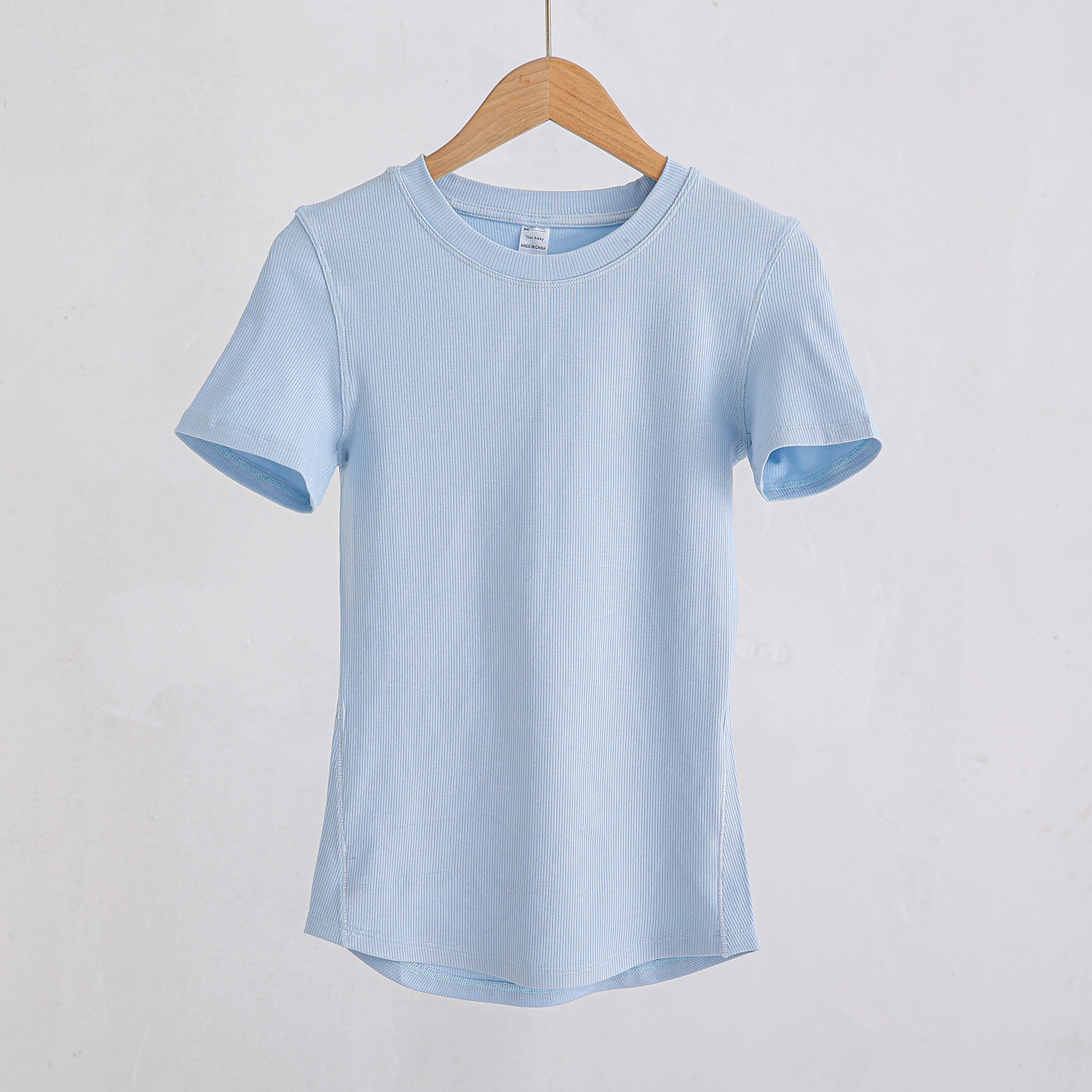 Baby blue ribbed crew neck t-shirt with short sleeves, hanging on a wooden hanger against a plain white background.