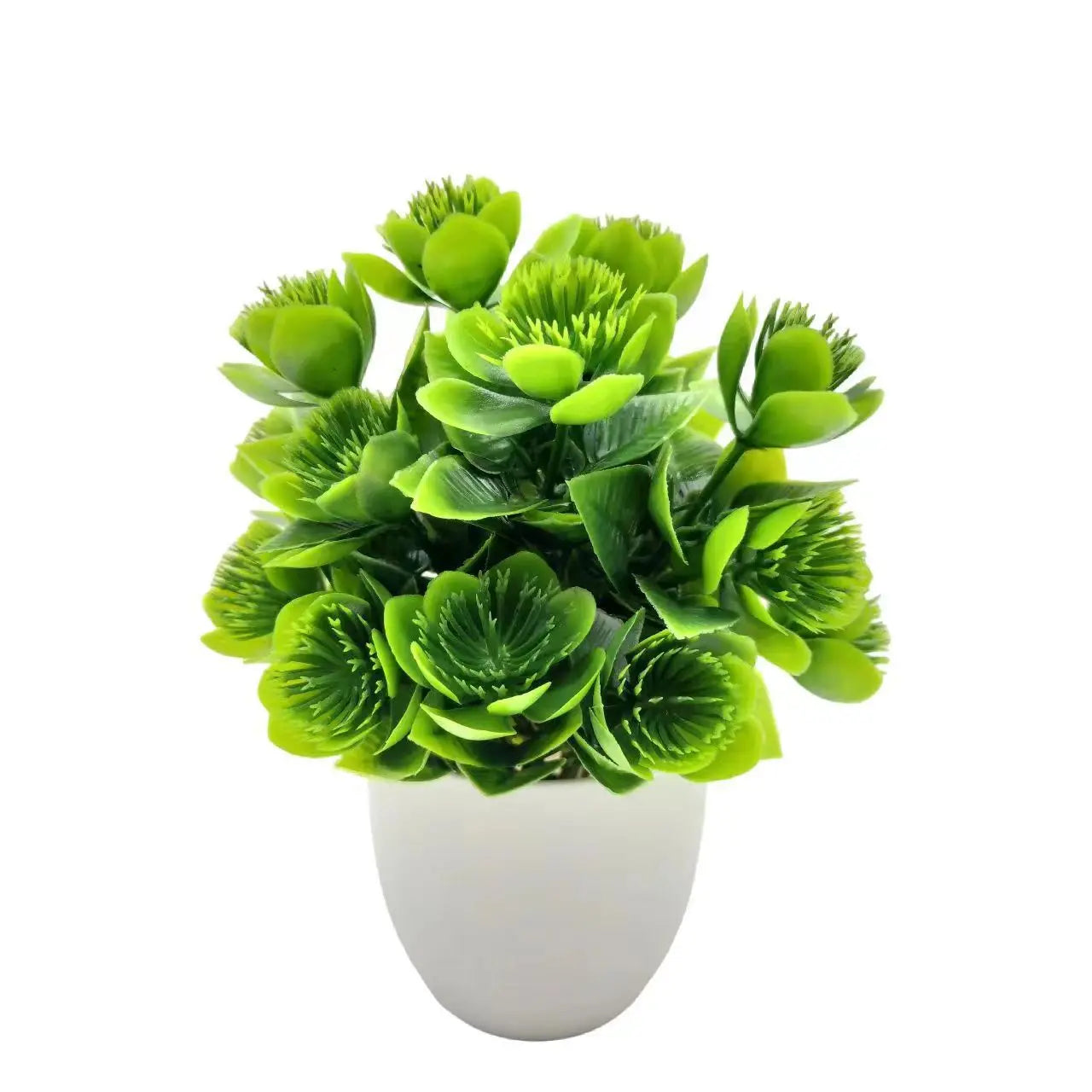 A small, artificial green plant with spiky, succulent-like leaves in a smooth, rounded white plastic pot.
