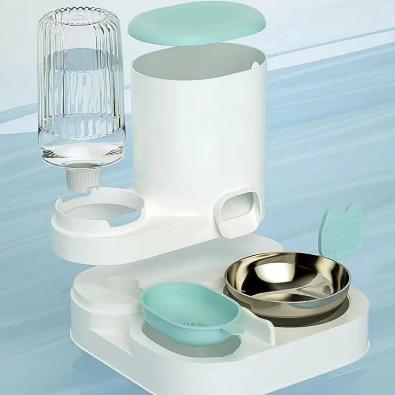 White and mint green automatic pet feeder with a water bottle, stainless steel bowl, and removable food compartment.