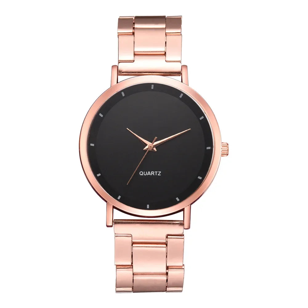 Elegant ladies' rose gold stainless steel watch with a minimalist black dial and matching metallic link strap.