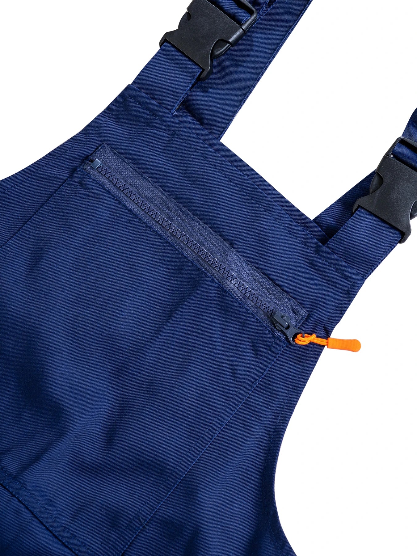 Navy blue bib overalls featuring adjustable straps with black buckles and a zipped chest pocket with an orange tab.