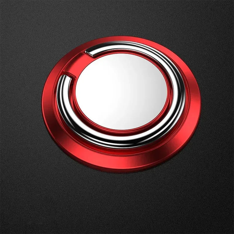 Circular red and silver phone ring holder with a metallic finish, centered on a dark textured background.