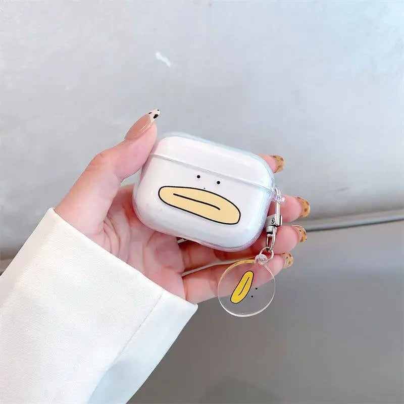 Clear plastic AirPods Pro case with a cute yellow duck face design and matching circular charm.