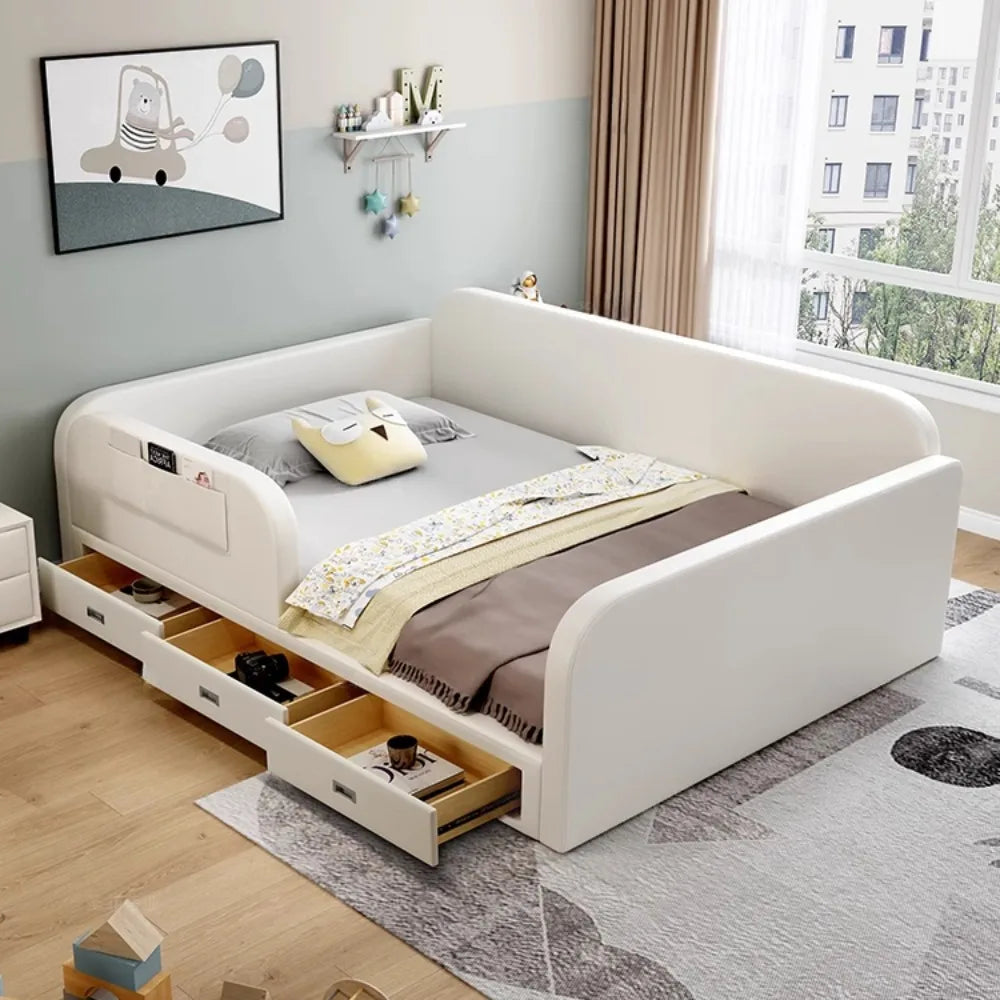 Modern white upholstered bed with protective sides, side pocket storage, and three pull-out wooden storage drawers.