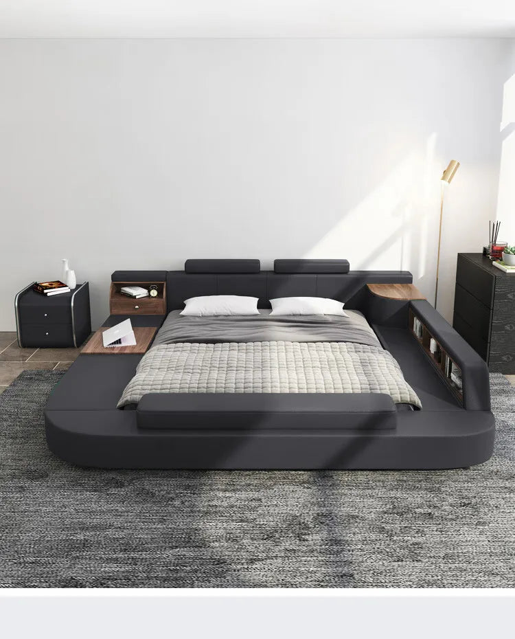 Modern dark grey upholstered bed with integrated side storage, shelves, and wooden accent tables.