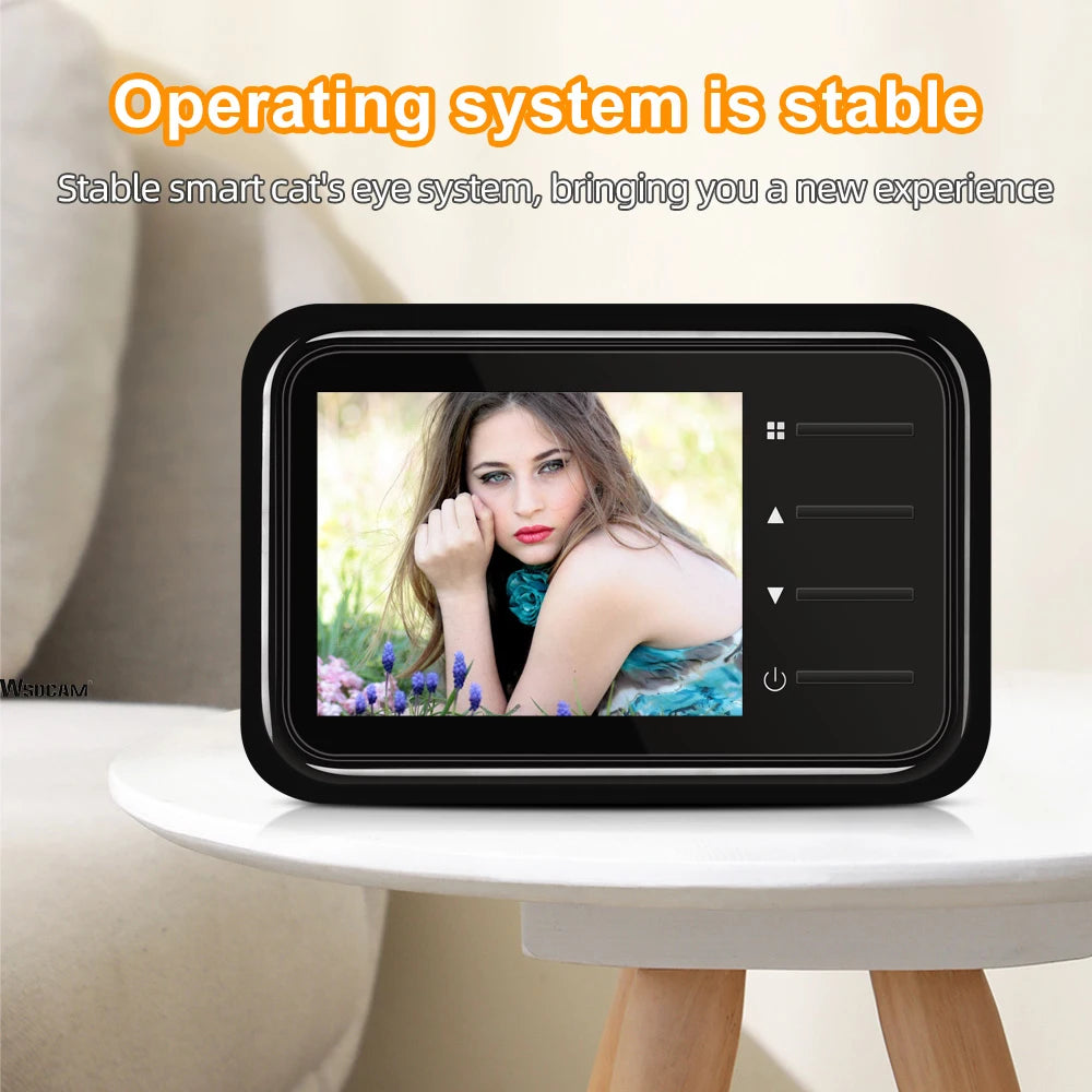 Black 2.4-inch digital door peephole camera with an LCD screen displaying a clear, bright image.