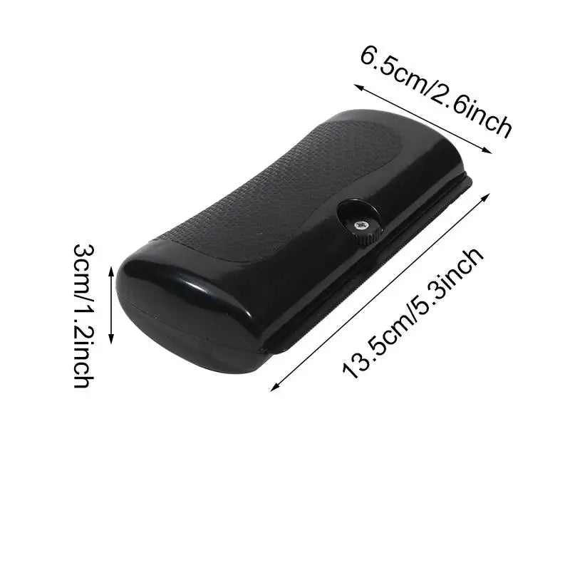 Black rectangular handheld plastic brush with measurements of 13.5cm by 6.5cm.