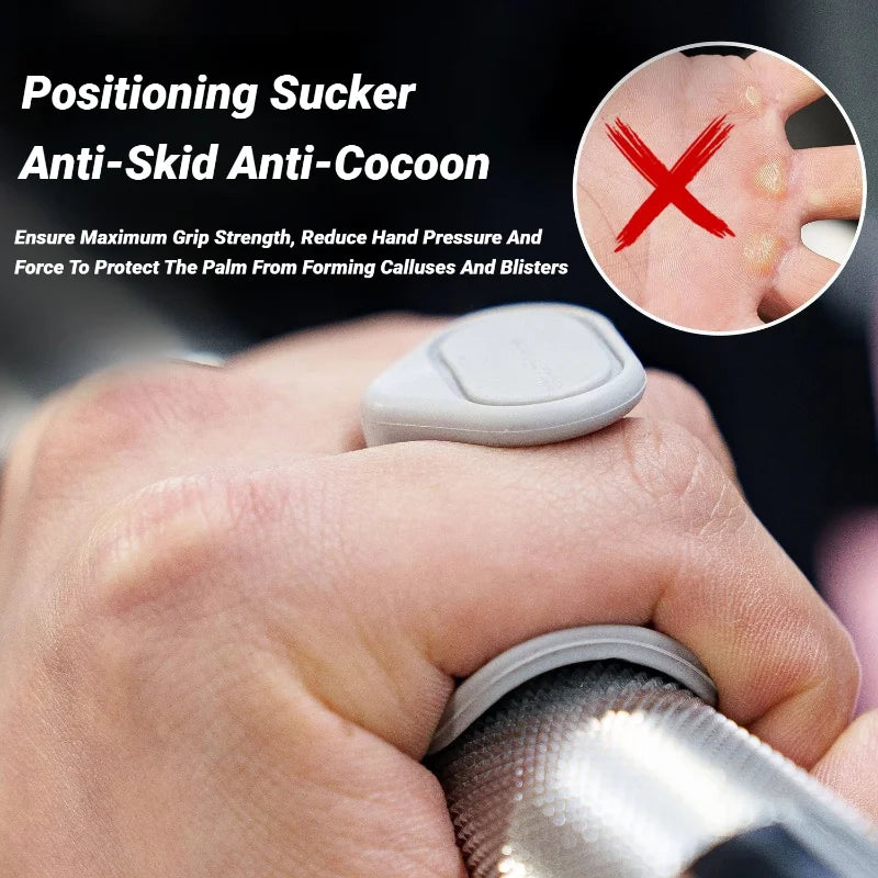 Grey silicone palm protector attached to a gym bar to improve grip and prevent calluses.