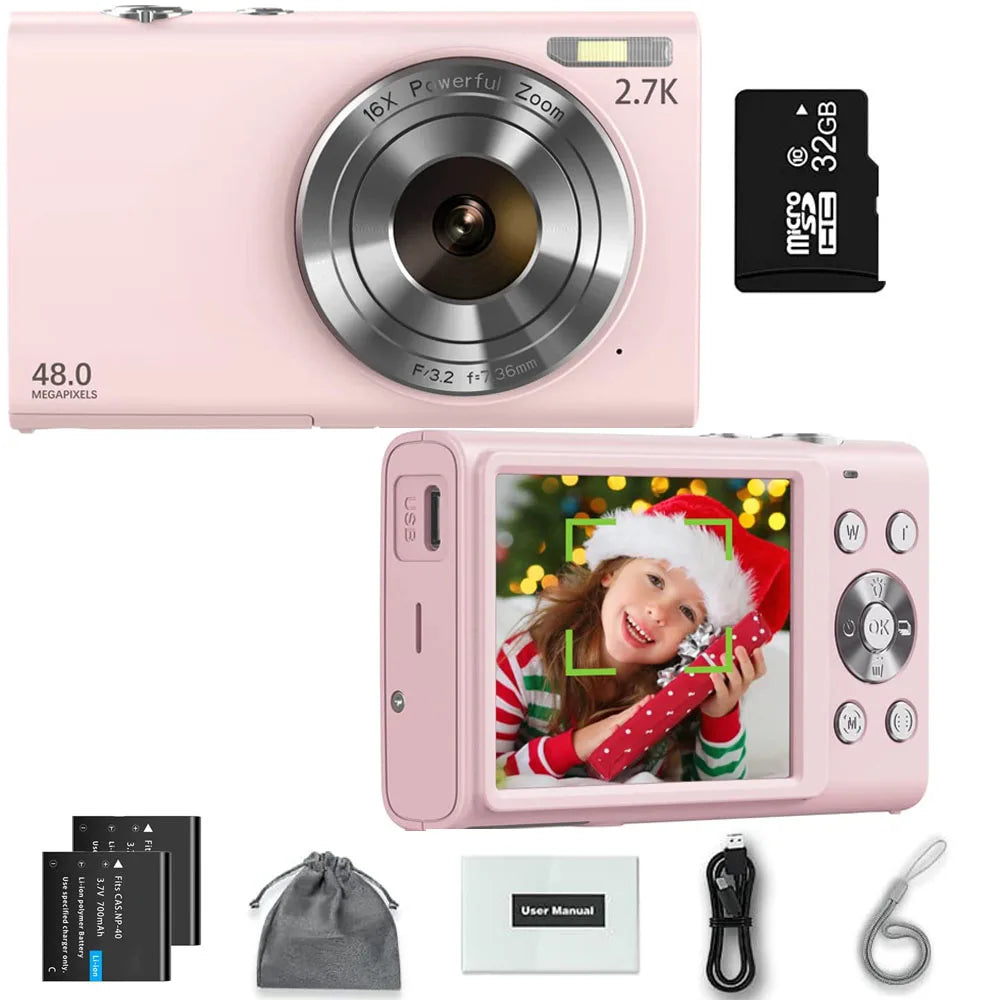 Pink digital camera with 48MP, 2.7K video, and 16x zoom, including a 32GB SD card, two batteries, and accessories.