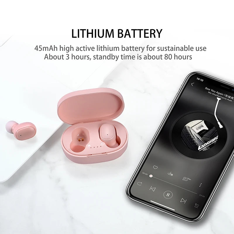 Pink wireless earbuds in an open charging case next to a smartphone showing a music player interface.