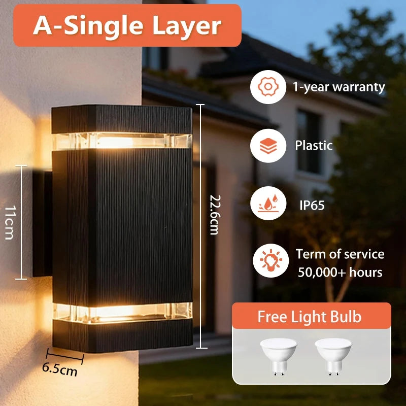 Modern black rectangular outdoor LED wall light casting a warm glow, with dimensions and technical specifications listed.