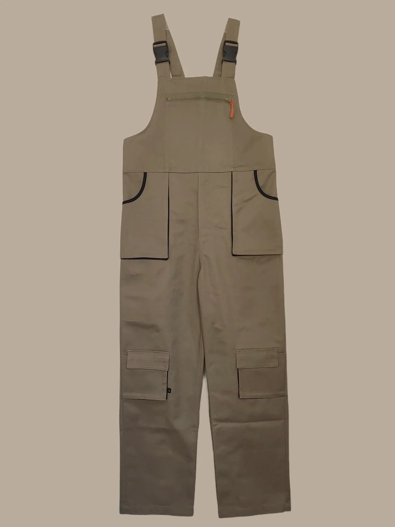 Beige heavy-duty dungarees with buckle straps, zip chest pocket, and multiple utility cargo pockets.